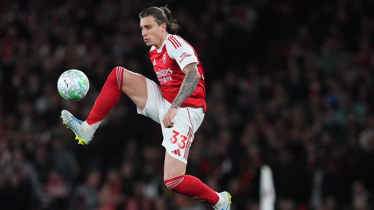 Arsenal's Riccardo Calafiori receives the ball during a Premier League soccer match between Arsenal and Burnley in London. - AP Photo