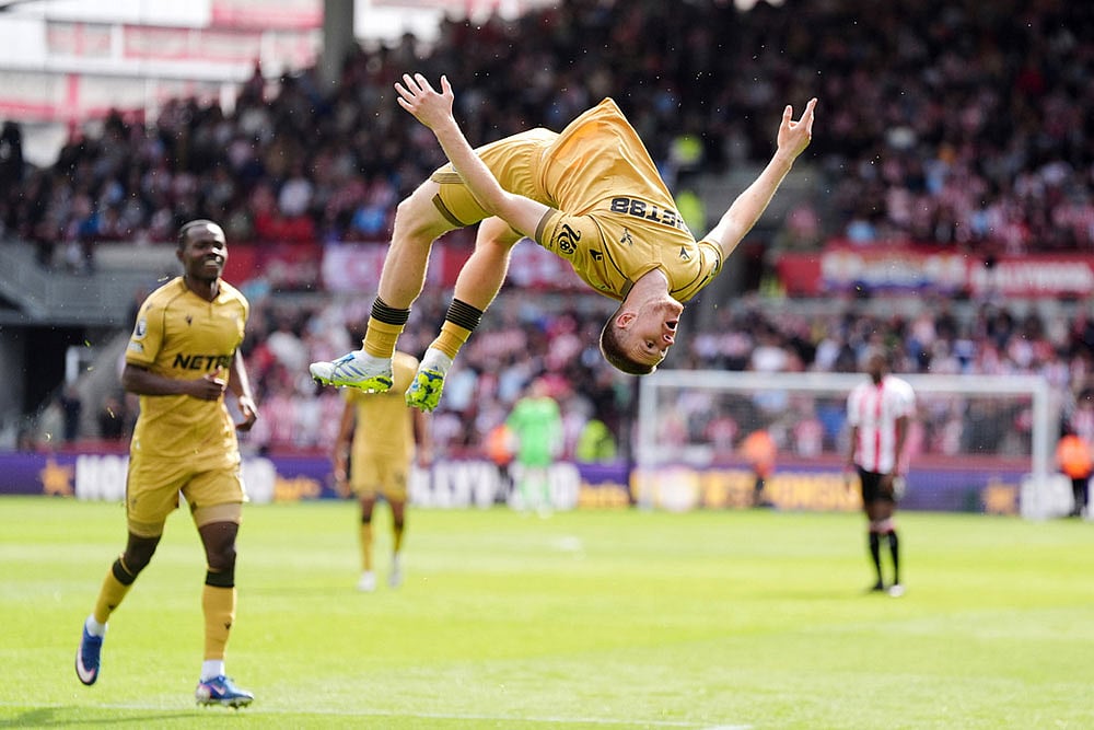 Crystal Palace's Adam Wharton celebrates scoring their side's second goal during their English Premier League soccer match against Brentford in London. - | Photo: Adam Davy/PA via AP