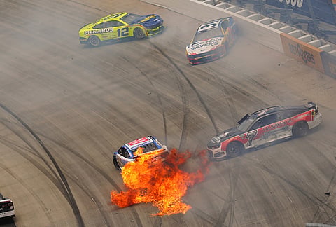 Ryan Preece (60) crashes during the NASCAR All-Star auto race at Dover Motor Speedway, in Dover, Delaware.