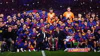 Track Winners, Promotions And Relegations Across Europe: Premier League, La Liga, Serie A, Bundesliga, Ligue 1, And More | Photo: AP/Joan Mateu Parra : Barcelona president Joan Laporta, center left, poses with the team and the trophy after defeating Real Madrid 2-0 to win the Spanish La Liga soccer championship with three rounds to spare, in Barcelona, Spain, Sunday, May 10, 2026.