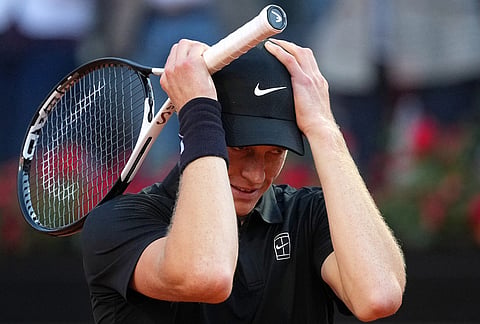 Jannik Sinner, of Italy, reacts after defeating Casper Ruud, of Norway, 6/4, 6/4 in the final match at the Italian Open tennis tournament, in Rome.