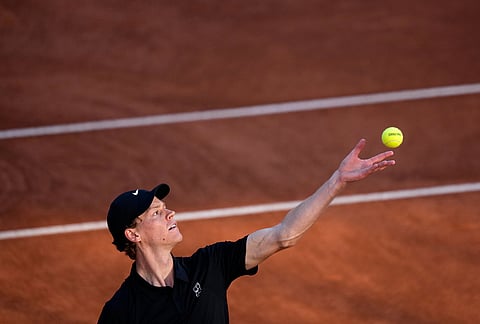 Jannik Sinner, of Italy, serves to Casper Ruud, of Norway, during the final match at the Italian Open tennis tournament, in Rome.