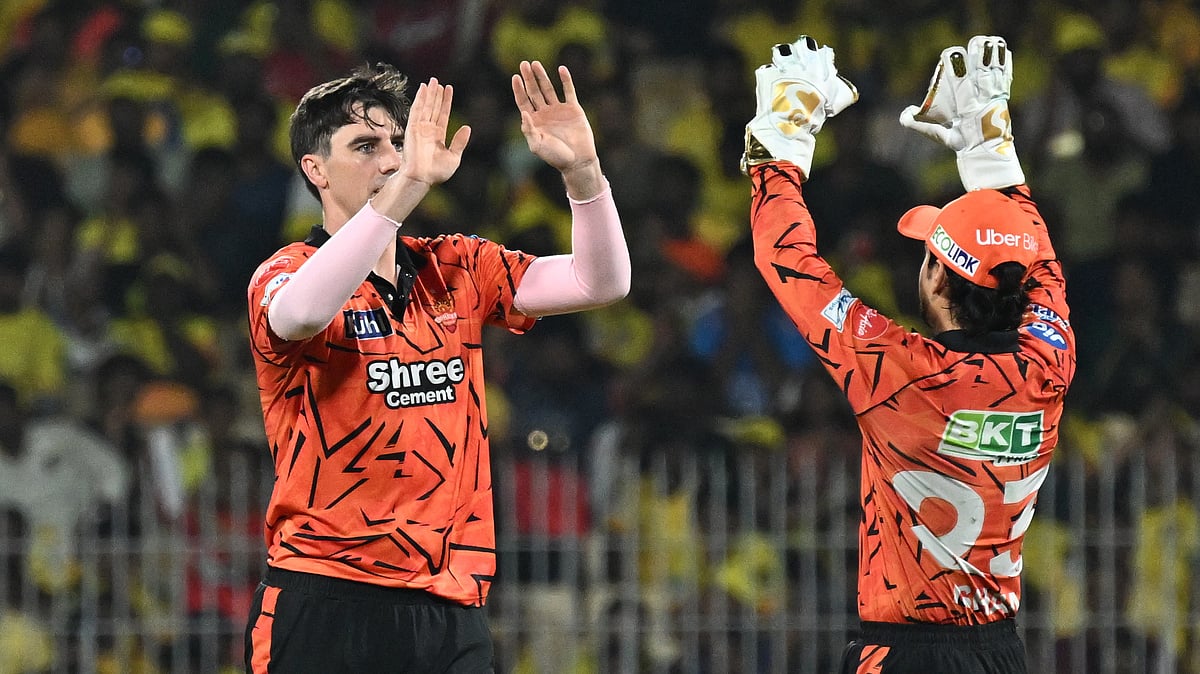 Pat Cummins and Ishan Kishan celebrate a wicket during IPL 2026 clash between SRH and CSK at the MA Chidambaram Stadium.  - AP Photo
