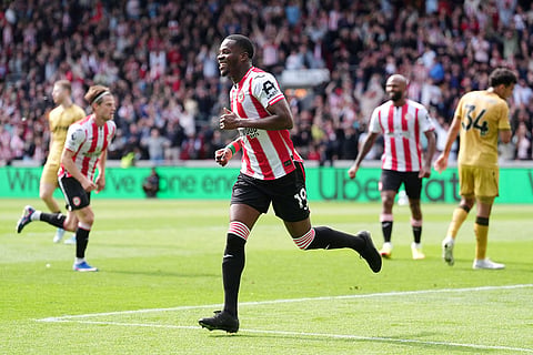 Brentford's Dango Ouattara celebrates scoring their side's first goal during their English Premier League soccer match against Crystal Palace in London.