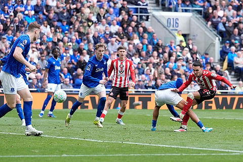Sunderland's Enzo Le Fee, right, scores their side's second goal of the game of the game during their English Premier League soccer match against Everton in Liverpool, England.