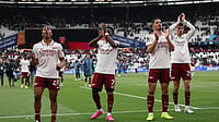 AP Photo : Arsenal footballers in action after the West Ham vs Arsenal Premier League 2025-26 match. 