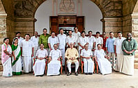 In First Cabinet Meeting, Satheesan Promises Welfare Push, White Paper On Finance PTI : Kerala Governor Rajendra Vishwanath Arlekar with newly sworn-in state Chief Minister VD Satheesan and the Council of Ministers after the swearing-in ceremony of the state government, in Thiruvananthapuram.