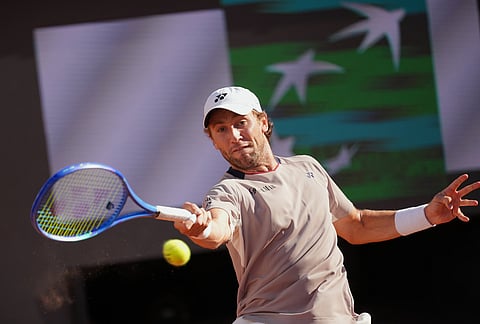 Casper Ruud, of Norway, returns the ball to Jannik Sinner, of Italy, during the final match at the Italian Open tennis tournament, in Rome.