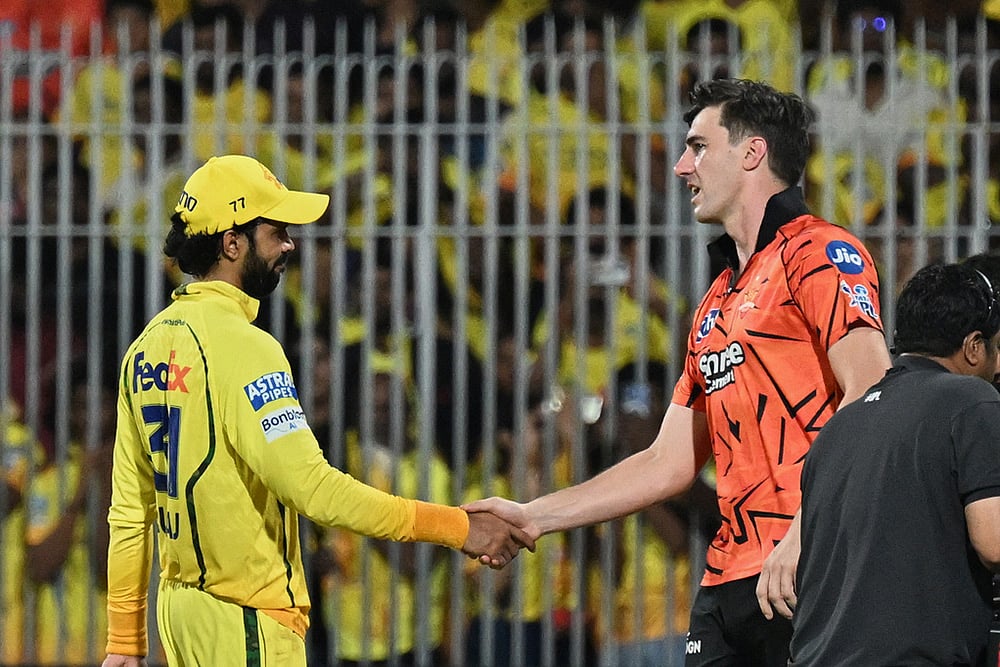 Sunrisers Hyderabad's captain Pat Cummins shakes hand with Chennai Super Kings' captain Ruturaj Gaikwad after wining the Indian Premier League cricket match against Chennai Super Kings' in Chennai, India. - | Photo: AP