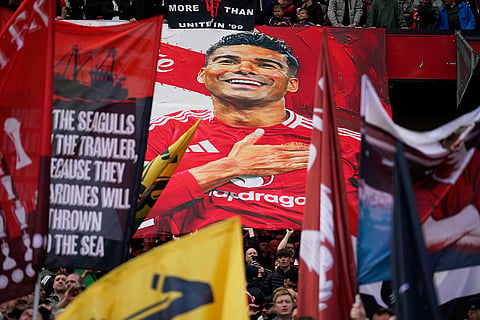 Manchester United fans display a tifo for Casemiro ahead of his last home game for Manchester United during the English Premier League soccer match between Manchester United and Nottingham Forest in Manchester, England.