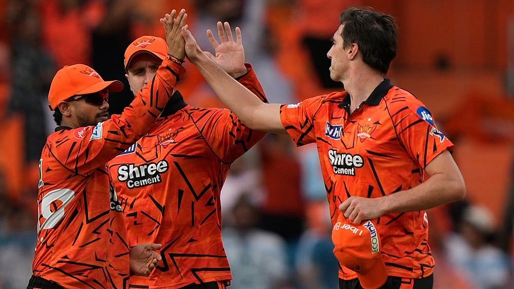Sunrisers Hyderabad's captain Pat Cummins, right, celebrates with teammates the wicket of Kolkata Knight Riders' Finn Allen during the Indian Premier League cricket match between Sunrisers Hyderabad and Kolkata Knight Riders in Hyderabad. - | Photo: AP/Mahesh Kumar A.