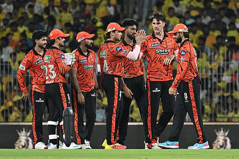 Sunrisers Hyderabad's Pat Cummins, second left, celebrates the wicket of Chennai Super Kings' captain Ruturaj Gaikwad with with teammates during the Indian Premier League cricket match between Chennai Super Kings' and Sunrisers Hyderabad in Chennai, India.