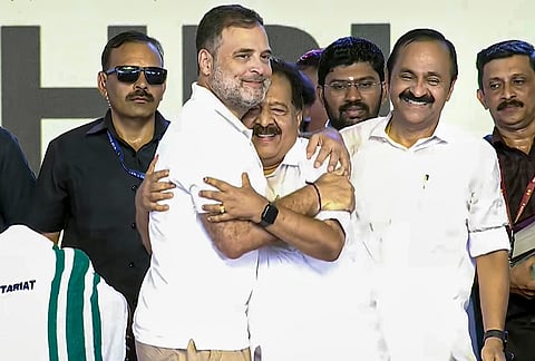 Newly sworn-in Kerala Minister Ramesh Chennithala being congratulated by LoP in Lok Sabha Rahul Gandhi during the swearing-in ceremony of the state government, in Thiruvananthapuram. 