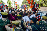 PTI : BJP Kashmir unit members in a scuffle with the police personnel after they took out a protest rally towards the residence of Jammu and Kashmir Chief Minister, against the operation of wine shops in the Kashmir Valley, demanding a complete ban on liquor sales, in Srinagar.