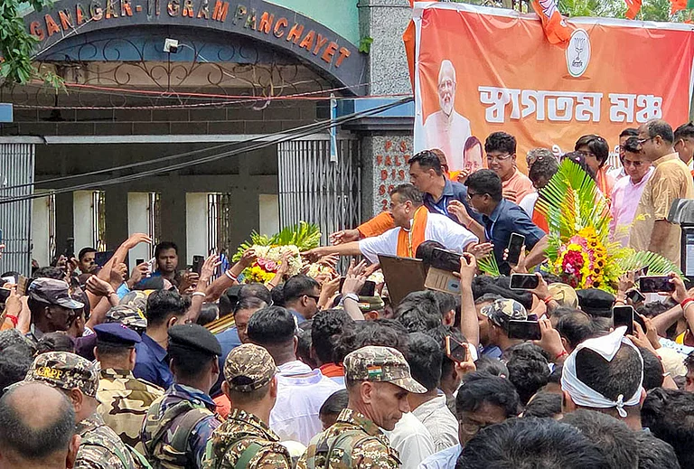 West Bengal Chief Minister Suvendu Adhikari holds a roadshow in support of BJP candidate for the Falta constituency, Debangshu Panda, on the final day of campaigning for the May 21 repoll, in South 24 Parganas. - | Photo: Handout via PTI