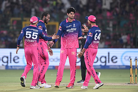Rajasthan Royals' Yash Raj, center, celebrates the wicket of Lucknow Super Giants' Josh Inglis during the Indian Premier League cricket match between Lucknow Super Giants and Rajasthan Royals in Jaipur, India.