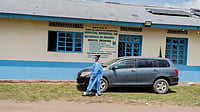 AP : A health worker wearing protective gear walks outside the a hospital in Bunia, Congo, Saturday, May 16, 2026.