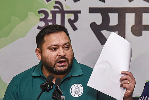 Leader of Opposition in the Bihar Assembly and RJD leader Tejashwi Yadav addresses media at his residence, in Patna, Bihar.