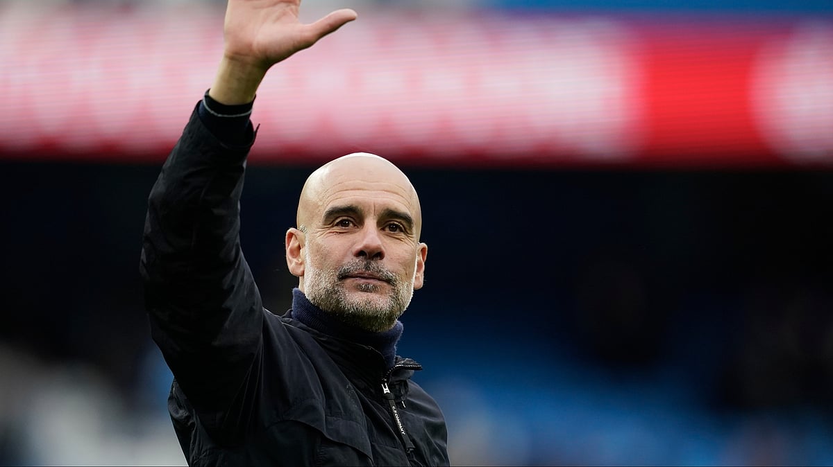 Manchester City's head coach Pep Guardiola greets fans at the end of the English Premier League soccer match between Manchester City and Brentford in Manchester, Saturday, May 9, 2026.  - | Photo: AP/Dave Thompson