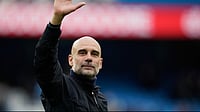 | Photo: AP/Dave Thompson : Manchester City's head coach Pep Guardiola greets fans at the end of the English Premier League soccer match between Manchester City and Brentford in Manchester, Saturday, May 9, 2026. 
