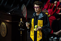 Billie Jean King Graduates: Tennis Legend Receives Her Bachelor's Degree In History At 82 | Photo: AP/Jae C. Hong : Tennis legend Billie Jean King, prepares to toss tennis balls to graduates after delivering remarks during a California State University, Los Angeles, commencement ceremony in Los Angeles.