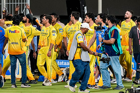 Chennai Super Kings' MS Dhoni and teammates walk on the field acknowledging the crowd after losing the match and being eliminated from the tournament following the Indian Premier League (IPL) 2026 T20 cricket match against Sunrisers Hyderabad in Chennai, Tamil Nadu.