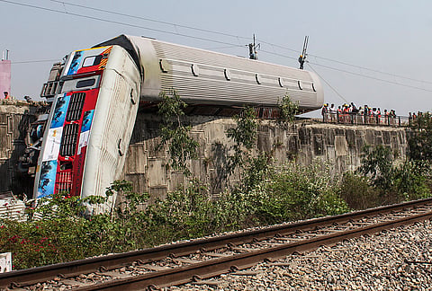 Railway officials at the site after three coaches of the Ujjaini Express derailed on Monday night near the Khand Gaon area, in Rishikesh, Uttarakhand.