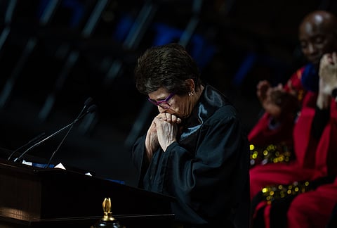 Tennis legend Billie Jean King pauses while delivering a speech during California State University, Los Angeles, commencement in Los Angeles.