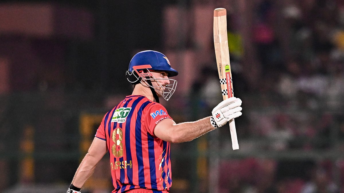 Mitchell Marsh celebrates his half century during the Indian Premier League match between Rajasthan Royals and Lucknow Super Giants, in Jaipur. - AP
