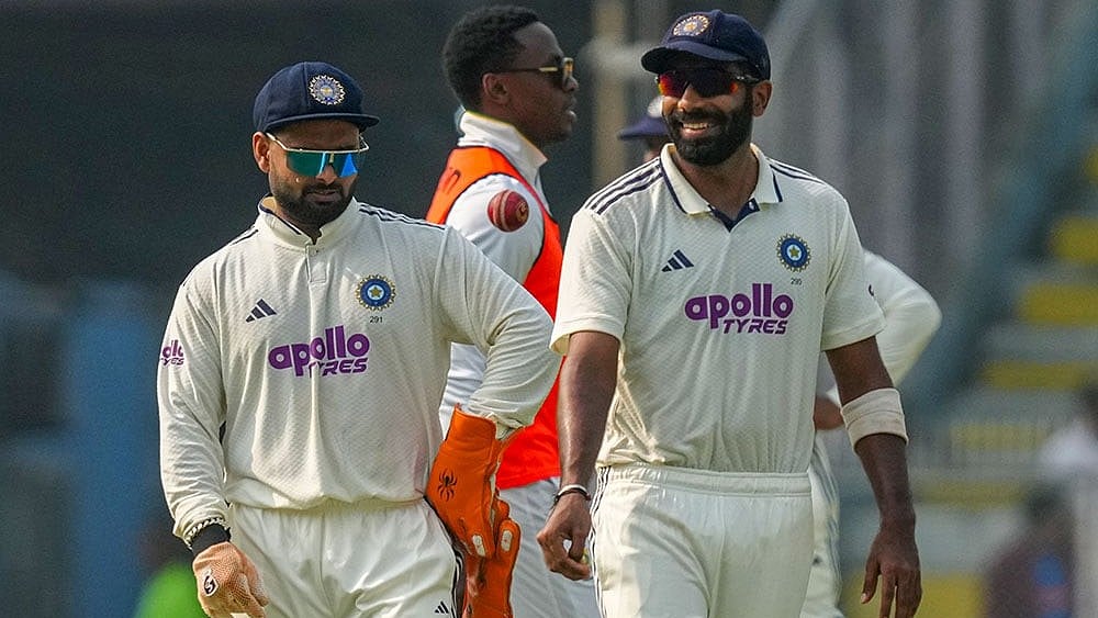 India's captain Rishabh Pant with Jasprit Bumrah during the day two of the second Test cricket match of a series between India and South Africa, at ACA Stadium in Guwahati - | Photo: PTI/Shahbaz Khan