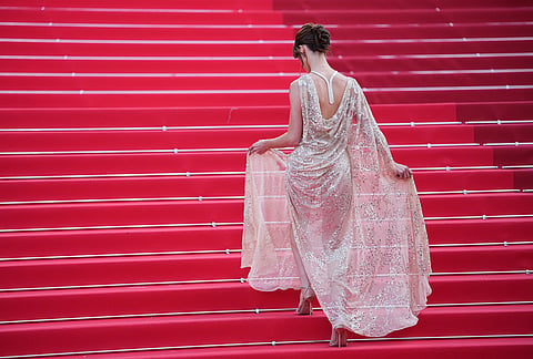 Daisy Edgar-Jones poses for photographers upon arrival at the premiere of the film 'Fjord' at the 79th international film festival, Cannes, southern France..