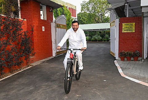 Haryana CM Nayab Saini moves on a bicycle towards Sukhna Lake in Chandigarh, in view of Prime Minister Narendra Modi's appeal for austerity. 