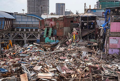 A demolition drive underway at Gareeb Nagar slum near Bandra East railway station conducted by Western Railway to remove more than 400 unauthorised structures following an order by Bombay High Court, in Mumbai, Maharashtra. 