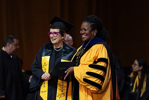 Tennis legend Billie Jean King, 82, left, poses with California State University, Los Angeles, President Berenecea Johnson Eanes after receiving her diploma during commencement in Los Angeles.