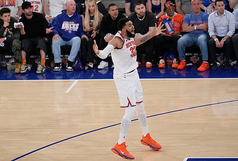 New York Knicks' Karl-Anthony Towns reacts after making a basket during the second half of Game 1 in the Eastern Conference finals NBA basketball playoffs series against the Cleveland Cavaliers, in New York. 