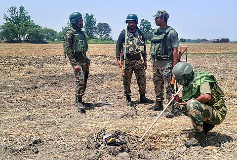 Security personnel recover and seize a consignment of around 2 kg of heroin suspected to have been dropped by a drone near the International Border in Jammu district.