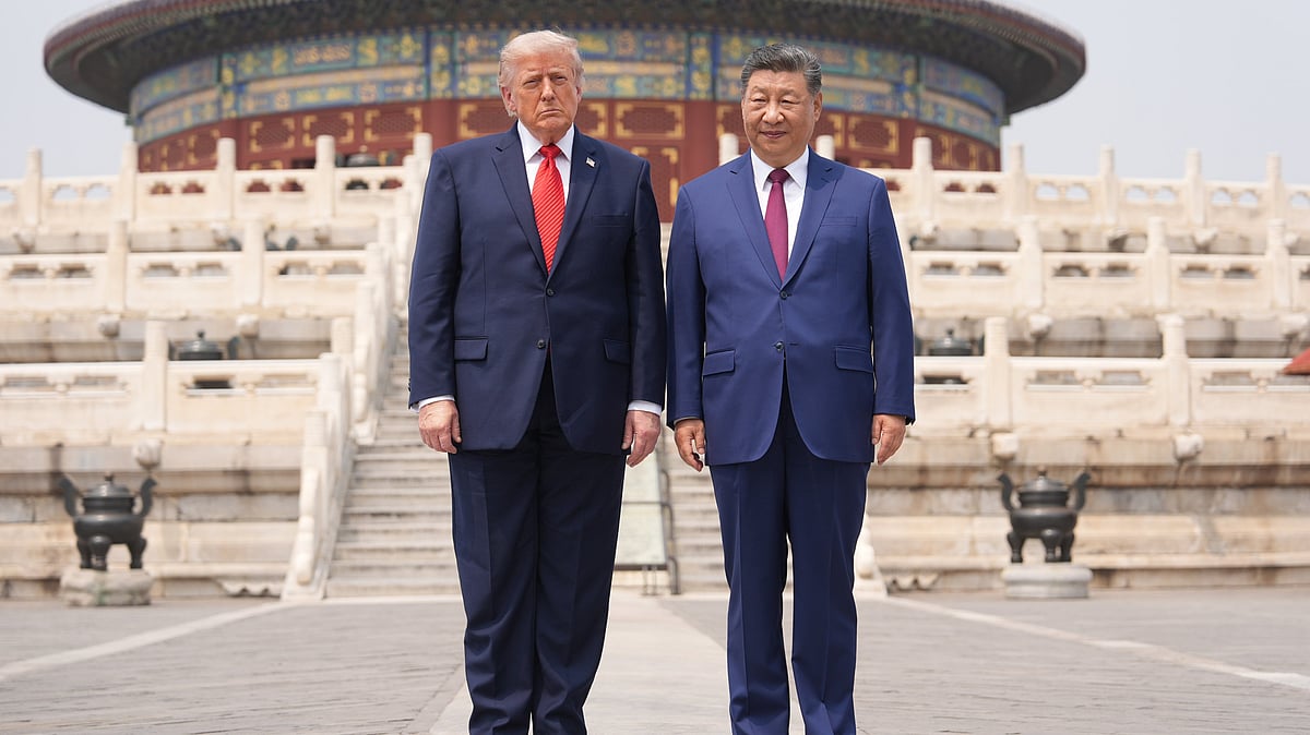 President Donald Trump, left, stands with Chinese President Xi Jinping at the Temple of Heaven on Thursday May 14, 2026, in Beijing.  - Mark Schiefelbein