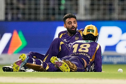 Kolkata Knight Riders' Varun Chakaravarthy, left, talks to Angkrish Raghuvanshi after drop a catch of Mumbai Indians' Tilak Varma during the Indian Premier League cricket match between Kolkata Knight Riders and Mumbai Indians, in Kolkata , India.