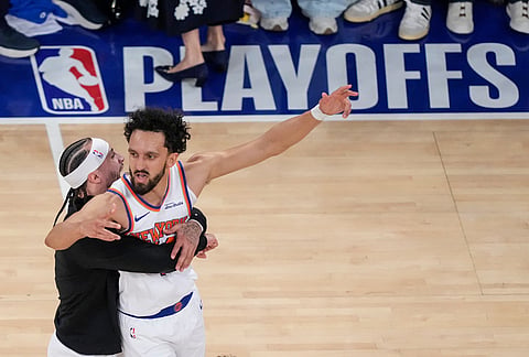New York Knicks guard Landry Shamet (44) is lifted off the ground by New York Knicks guard Jose Alvarado (5) after scoring a three-point basket during the first overtime of Game 1 in the Eastern Conference finals NBA basketball playoffs series against the Cleveland Cavaliers, in New York. 