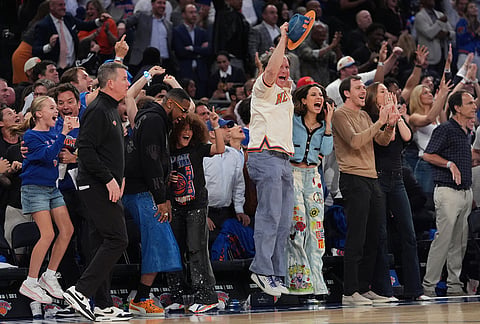 New York Knicks fans react during the second half of Game 1 in the Eastern Conference finals NBA basketball playoffs series against the Cleveland Cavaliers, in New York. 