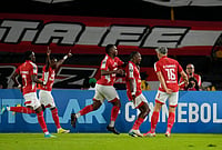 | Photo: AP/Fernando Vergara : Hugo Rodallega of Colombia's Independiente Santa Fe, second from right, celebrates with teammates after scoring his side's second goal against Argentina's Platense during a Copa Libertadores Group E soccer match in Bogota, Colombia.