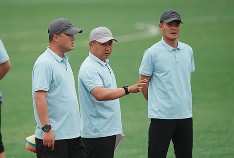 North Korea's Naegohyang Women's FC coach Ri Yu Il, center, speaks during a training session ahead of the AFC Women's Champions League semifinal match against South Korea's Suwon FC Women in Suwon, South Korea.