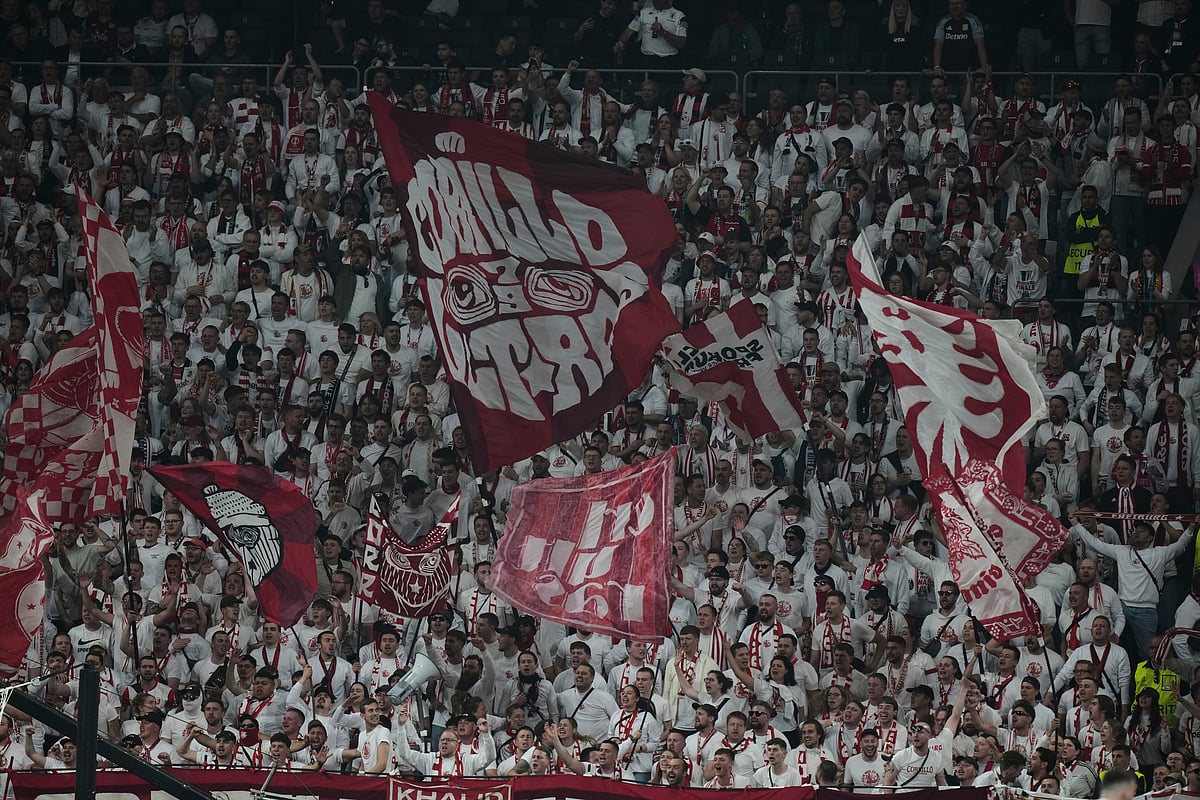 Freiburg fans cheer for their team during the Europa League final soccer match between Freiburg and Aston Villa in Istanbul, Turkey, Wednesday.