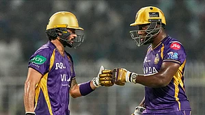 AP Photo : Kolkata Knight Riders' Manish Pandey, and Rovman Powell toss during the Indian Premier League cricket match between Kolkata Knight Riders and Mumbai Indians, in Kolkata.