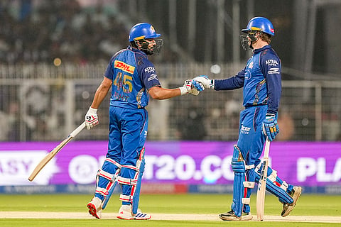 Mumbai Indians' Ryan Rickelton, right, and Rohit Sharma during the Indian Premier League (IPL) 2026 T20 cricket match between Kolkata Knight Riders and Mumbai Indians, in Kolkata, West Bengal.
