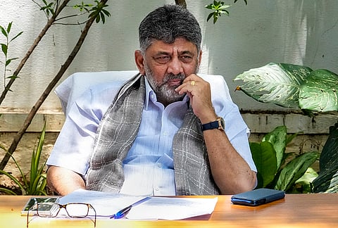 Karnataka Deputy Chief Minister DK Shivakumar during a consultation with farmers' representatives regarding the Greater Bengaluru Comprehensive Suburban Project (Bidadi Township), at Kumarapark in Bengaluru.