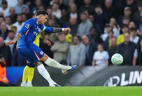 Chelsea's Enzo Fernandez scores during a Premier League soccer match between Chelsea and Tottenham in London.