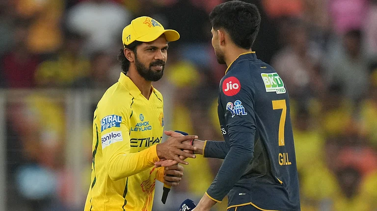 Chennai Super Kings' captain Ruturaj Gaikwad, left, and Gujarat Titans' captain Shubman Gill shake hands before the Indian Premier League cricket match between in Ahmedabad, India, Thursday, May 21, 2026 - (AP Photo/Ajit Solanki)