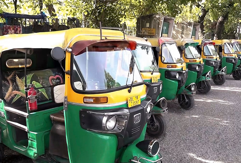 Autorickshaws parked in a queue during a three-day strike call by All India Motor Transport Congress (AIMTC) to protest against the city government's decision to hike the environment compensation cess on commercial vehicles, in New Delhi. - | Photo: PTI
