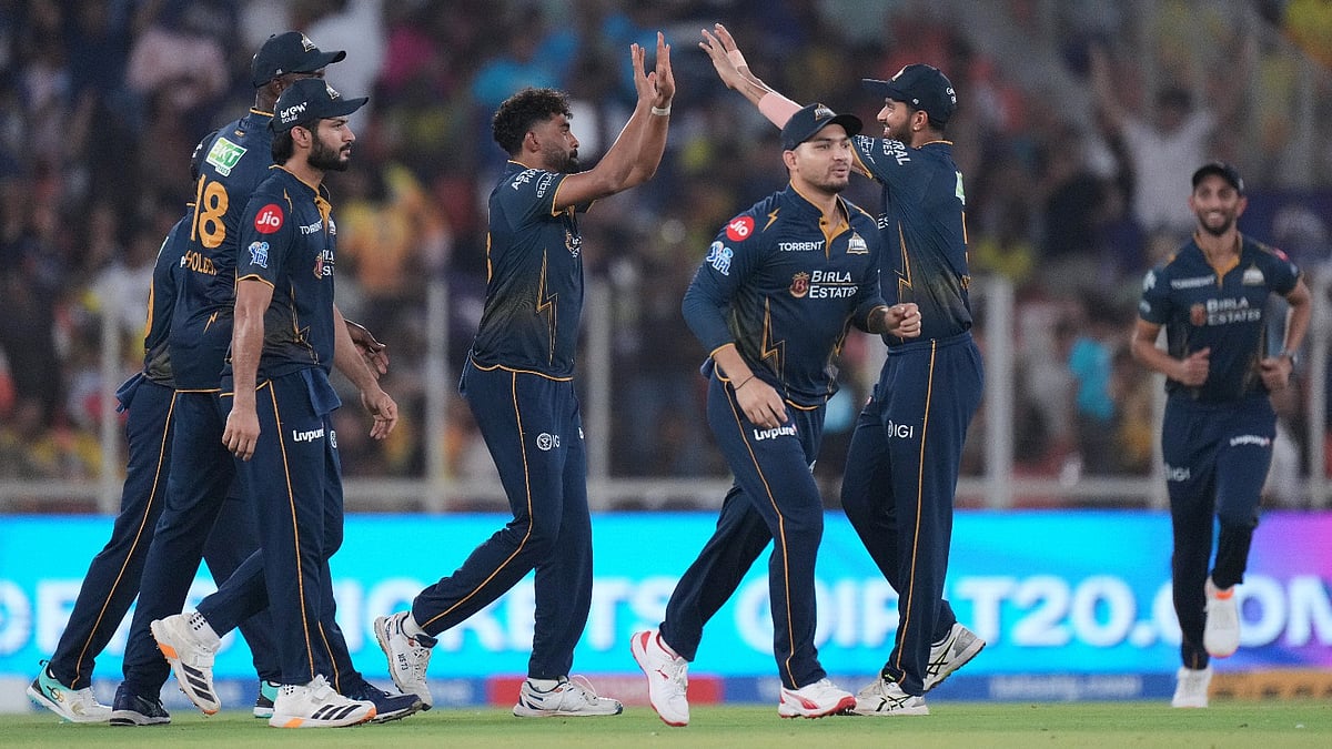 Gujarat Titans' Mohammed Siraj celebrate with teammates the wicket of Chennai Super Kings' Sanju Samson during the Indian Premier League cricket match between Gujarat Titans and Chennai Super Kings in Ahmedabad, India, Thursday, May 21, 2026 - (AP Photo/Ajit Solanki)